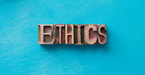 Ethics word written with wood type blocks