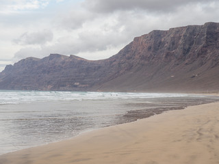 Fototapeta na wymiar Beach Caleta de Famara on island Lanzarote.