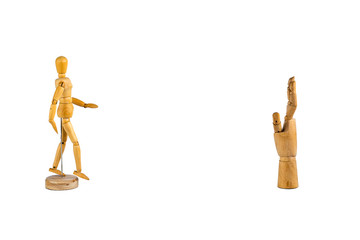 Wooden hand signalling stop and mannequin isolated on white background - social distancing concept