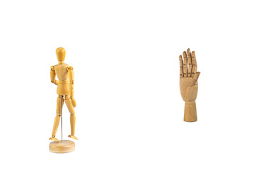 Wooden hand signalling stop and mannequin isolated on white background - social distancing concept