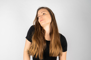 Young woman in black shirt with long hair