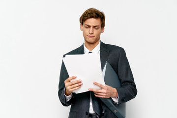 young businessman holding a clipboard