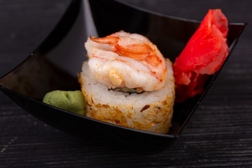 Assorty of sushi and roll, serve with red ginger and wasabi sauce