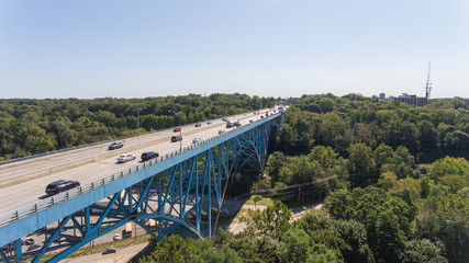 The Route 8 Bridge heading to Downtown Akron. The bridge has blue, metal undergirding.