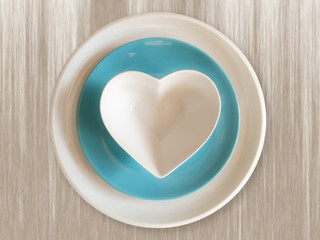 Three empty plates on wooden table