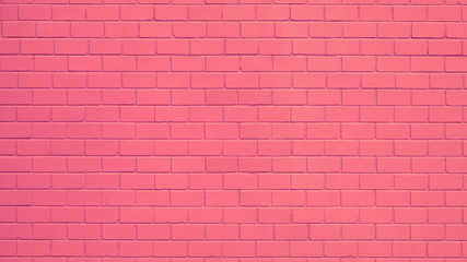 Texture of a pink painted brick wall as a background or wallpaper