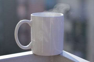 A cup of coffee in a balcony