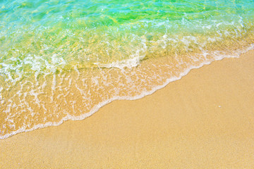 Fototapeta na wymiar sand beach and sea surface for background