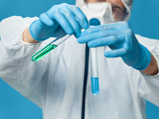 scientist holding test tube