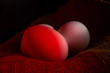 Three egg in sack with black background