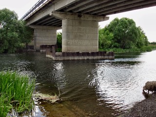 Automobile bridge in the upper reaches of the Seim river of the Kursk region of the Russian Federation.