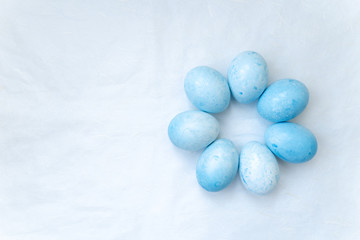 Easter colored egg on a light background background.