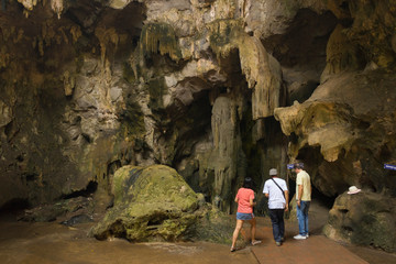 The golden Buddha inside Khao Luang Cave in Phetchaburi,Thailand