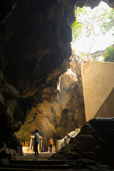 The golden Buddha inside Khao Luang Cave in Phetchaburi,Thailand