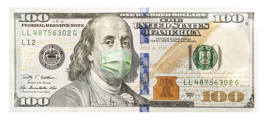 One hundred dollar bill with a face mask due to the covid-19
