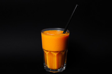 glass of smoothie on black studio background best