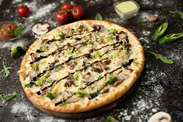 Italian cuisine. Pizza with various toppings.