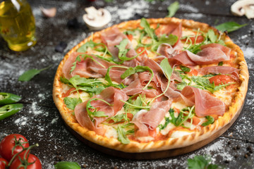 Italian cuisine. Pizza with various toppings.
