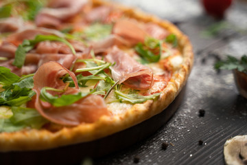 Italian cuisine. Pizza with various toppings.