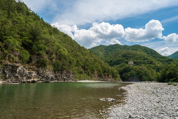 The river Trebbia and the surrounding hills during the summer (Emilia Romagna, Italy)