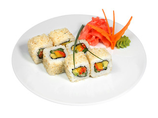 Sushi rolls with vegetables, sesame and nori. With pickled ginger and wasabi on white round plate