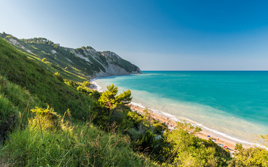 The Mezzavalle beach along the mount Conero coastline near Ancona during the summer (Marche, Italy)