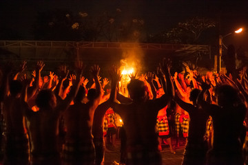 Artists perform famous traditional Kecak dance in Ubud, Indonesia. High level of noise