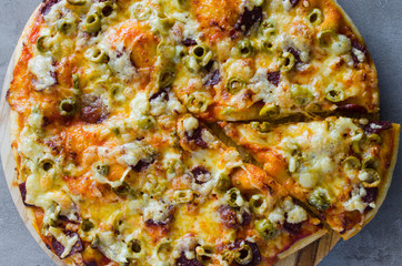 Freshly baked appetizing pizza homemade. Food background.