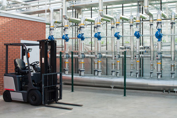 Loader and water pumps from boilers in an industrial greenhouse