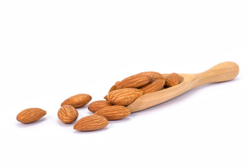 Closeup almond nuts isolated on white background. 