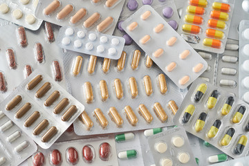 Supplements and pills blister packs background