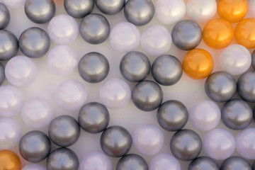 close up of plastic toy colorful ball at the playground for children