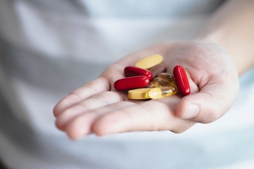 image of pills in hand