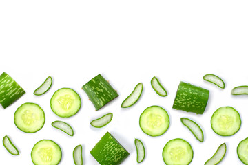 Close up fresh organic aloe vera and cucumber sliced isolated on white background. Pattern texture for beauty and spa concept.Herbal medicine plant concept. Top view. Flat lay. Space for text.