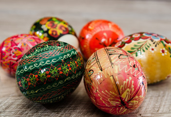 painted easter eggs on a wooden background