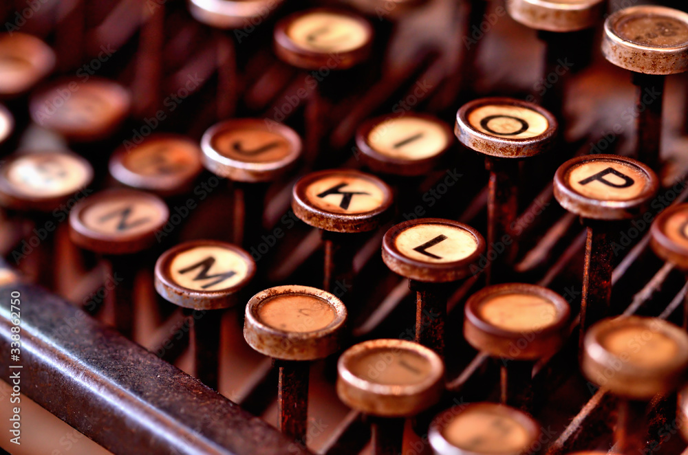 Fototapete Detail of antique typewriter keyboard from first world war. Low depth of field.