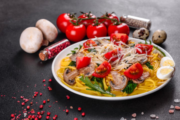 Spaghetti with mushrooms, cheese, spinach, rukkola and cherry tomatoes