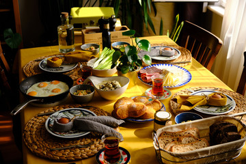 Easter breakfast. Cosy home environment. Warm breakfast table.
