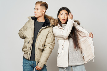 young couple in winter clothes