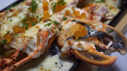 Obraz na płótnie Canvas Cheesy lobster claw with Salmon roe fusion seafood