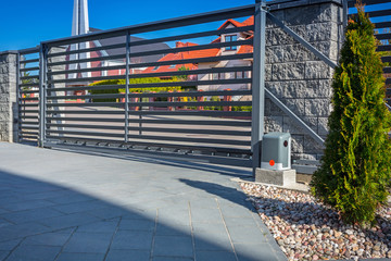 Stone fence and entrance gate with remote control