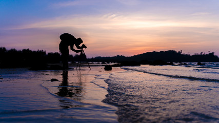 Silhouette Photographer With Sea View