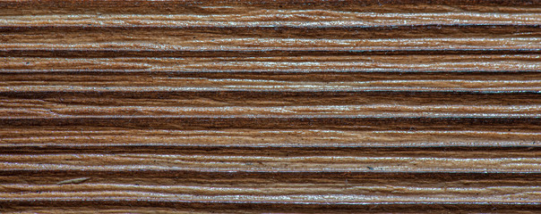 Wooden vintage background varnished. Photographed close-up.