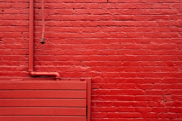 Pared de ladrillos pintada de rojo de la ciudad de Los Angeles, California.