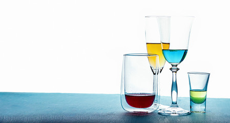 Colorful cocktails flatlay, we stay at home and drink alcohol and wait for a pandemic