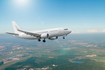 Aircraft approach before landing with landing gear.