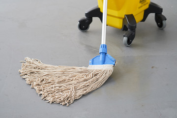 Mop and bucket, janitorial service.