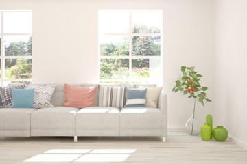 White living room with sofa and summer landscape in window. Scandinavian interior design. 3D illustration