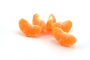 Peeled orange Mandarin (Clementine). Separated on white background.