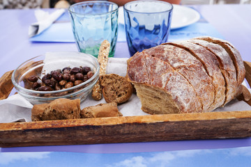 Olives and bread is a traditional Greek food served before the main course.